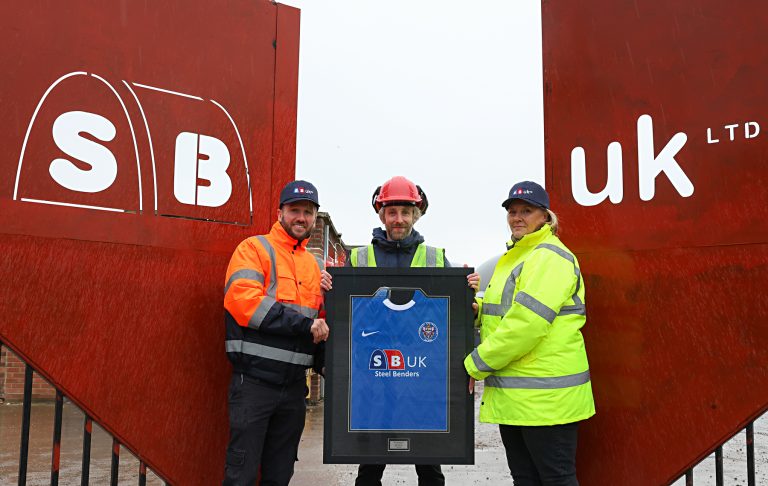 Steel Benders UK celebrates major milestone with a shirt handed over by Thornaby FC